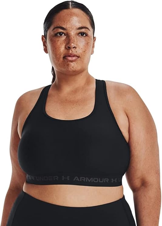 The Under Armour Women’s Cross-Back Mid Bra delivers reliable mid-level support with breathable, sweat-managing fabric. Ideal for workouts and humid climates, it balances comfort, coverage, and confidence.