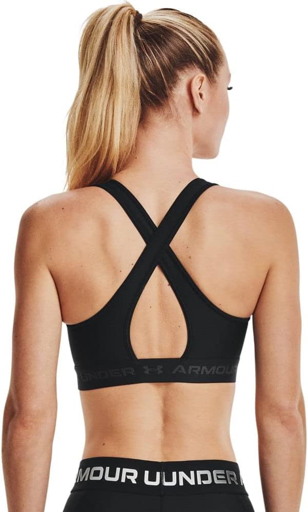 The Under Armour Women’s Cross-Back Mid Bra delivers reliable mid-level support with breathable, sweat-managing fabric. Ideal for workouts and humid climates, it balances comfort, coverage, and confidence.
