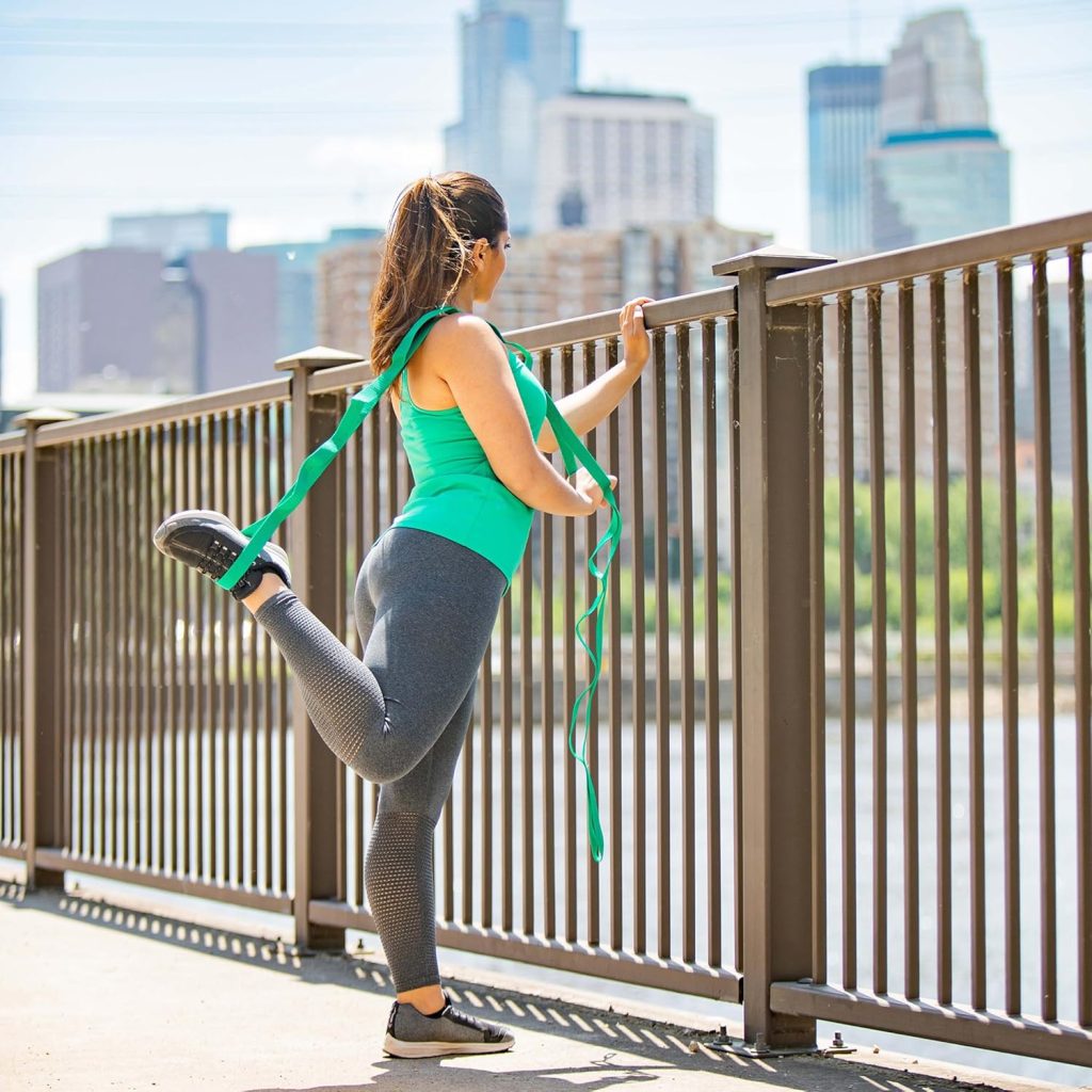 The OPTP The Original Stretch Out Strap with Exercise Book is a durable, guided stretching tool designed to improve flexibility and muscle recovery. It includes an instructional book to help users stretch safely and effectively at home.